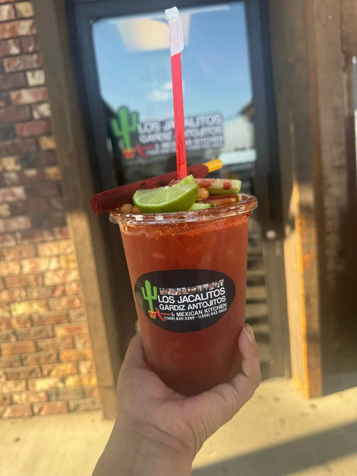 Michelada to-go in front of restaurant